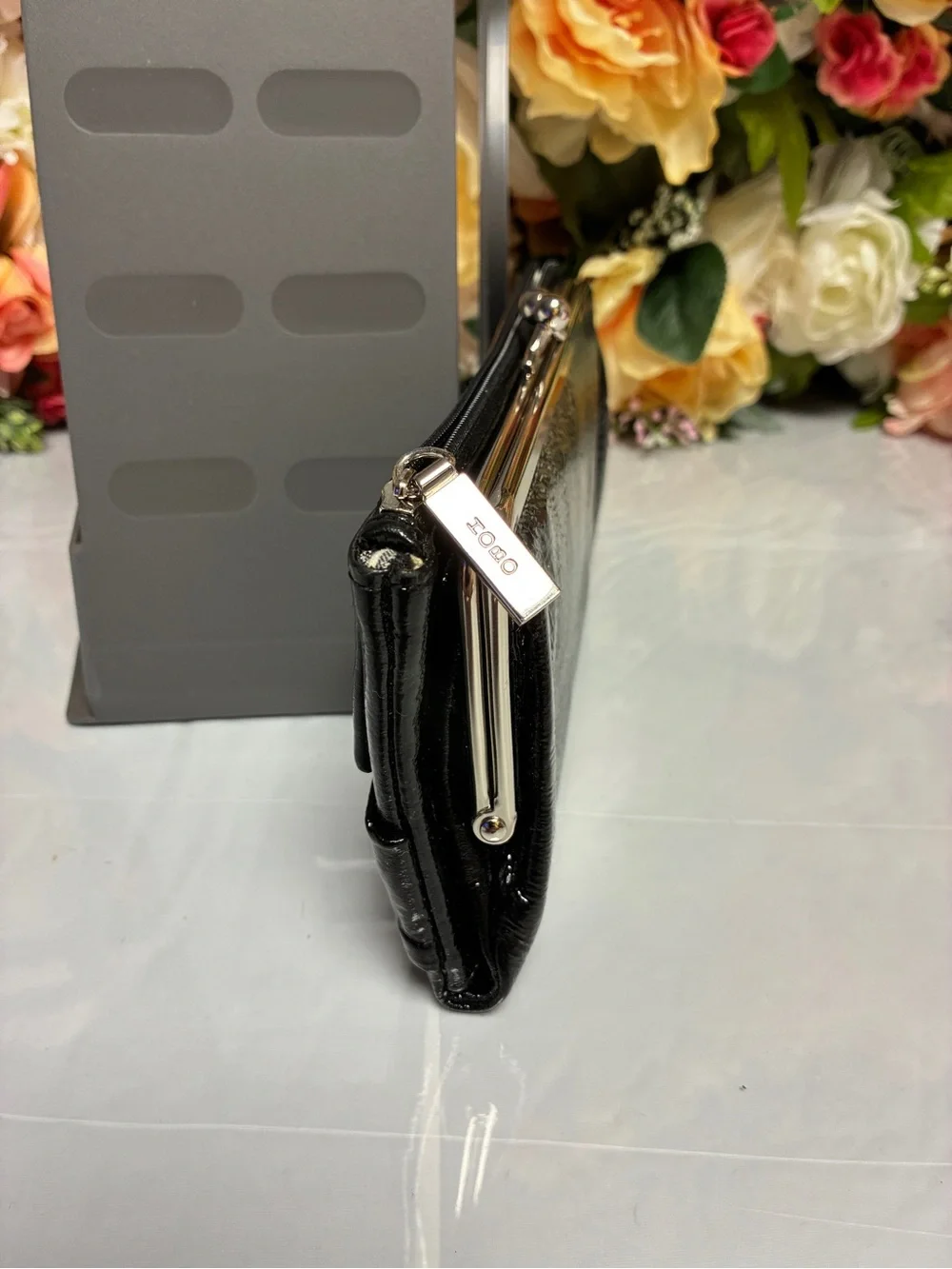HOBO International Black Patent Finish Bow Kiss Lock Continental Wallet Clutch